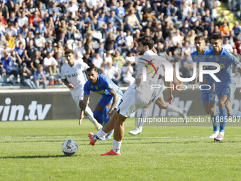 Napoli's Khvicha Kvaratskhelia scores their first goal on a penalty during the Serie A soccer match between Empoli FC and SSC Napoli at Stad...