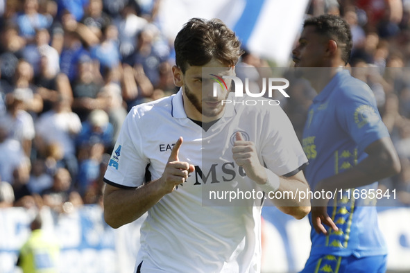 Napoli's Khvicha Kvaratskhelia celebrates after scoring their first goal during the Serie A soccer match between Empoli FC and SSC Napoli at...