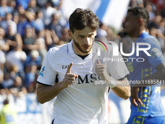 Napoli's Khvicha Kvaratskhelia celebrates after scoring their first goal during the Serie A soccer match between Empoli FC and SSC Napoli at...