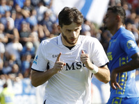 Napoli's Khvicha Kvaratskhelia celebrates after scoring their first goal during the Serie A soccer match between Empoli FC and SSC Napoli at...