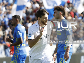 Napoli's Khvicha Kvaratskhelia celebrates after scoring their first goal during the Serie A soccer match between Empoli FC and SSC Napoli at...