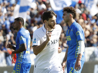 Napoli's Khvicha Kvaratskhelia celebrates after scoring their first goal during the Serie A soccer match between Empoli FC and SSC Napoli at...