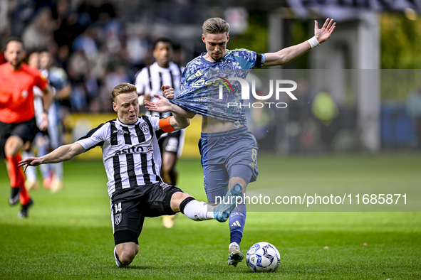 Heracles Almelo midfielder Brian de Keersmaecker and AFC Ajax Amsterdam midfielder Kenneth Taylor play during the match between Heracles Alm...