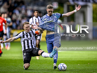 Heracles Almelo midfielder Brian de Keersmaecker and AFC Ajax Amsterdam midfielder Kenneth Taylor play during the match between Heracles Alm...