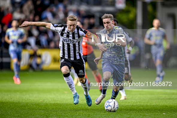 Heracles Almelo midfielder Brian de Keersmaecker and AFC Ajax Amsterdam midfielder Kenneth Taylor play during the match between Heracles Alm...