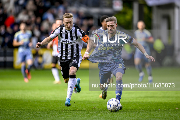 Heracles Almelo midfielder Brian de Keersmaecker and AFC Ajax Amsterdam midfielder Kenneth Taylor play during the match between Heracles Alm...