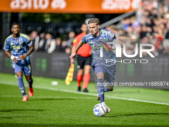 AFC Ajax Amsterdam midfielder Kenneth Taylor plays during the match between Heracles Almelo and Ajax at the Asito stadium for the Dutch Ered...