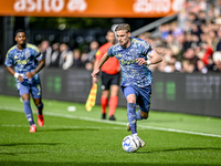 AFC Ajax Amsterdam midfielder Kenneth Taylor plays during the match between Heracles Almelo and Ajax at the Asito stadium for the Dutch Ered...