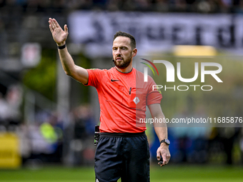 Referee Edwin van de Graaf officiates during the match between Heracles Almelo and Ajax at the Asito Stadium for the Dutch Eredivisie season...