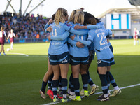 Jill Roord #10 of Manchester City W.F.C. celebrates her goal with teammates during the Barclays FA Women's Super League match between Manche...