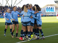 Jill Roord #10 of Manchester City W.F.C. celebrates her goal with teammates during the Barclays FA Women's Super League match between Manche...