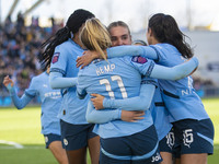 Jill Roord #10 of Manchester City W.F.C. celebrates her goal with teammates during the Barclays FA Women's Super League match between Manche...