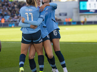 Jill Roord #10 of Manchester City W.F.C. celebrates her goal with teammates during the Barclays FA Women's Super League match between Manche...