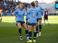 Jill Roord #10 of Manchester City W.F.C. celebrates her goal with teammates during the Barclays FA Women's Super League match between Manche...