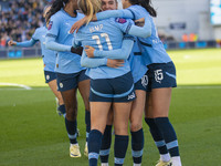 Jill Roord #10 of Manchester City W.F.C. celebrates her goal with teammates during the Barclays FA Women's Super League match between Manche...