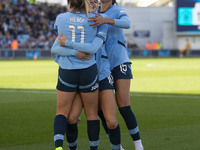 Jill Roord #10 of Manchester City W.F.C. celebrates her goal with teammates during the Barclays FA Women's Super League match between Manche...