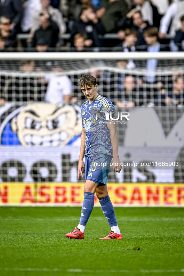 AFC Ajax Amsterdam defender Youri Baas feels disappointed after Heracles Almelo forward Luka Kulenovic scores a goal, making it 1-0, during...