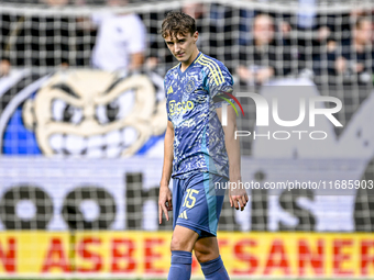 AFC Ajax Amsterdam defender Youri Baas feels disappointed after Heracles Almelo forward Luka Kulenovic scores a goal, making it 1-0, during...