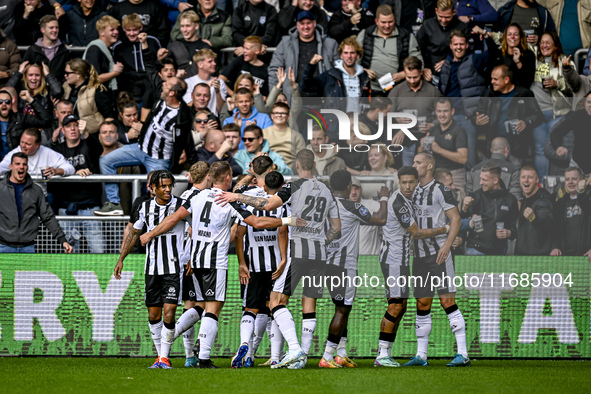 Players of Heracles Almelo celebrate the goal of Heracles Almelo forward Luka Kulenovic, making it 1-0, during the match between Heracles Al...