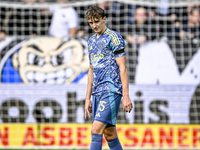 AFC Ajax Amsterdam defender Youri Baas feels disappointed after Heracles Almelo forward Luka Kulenovic scores a goal, making it 1-0, during...