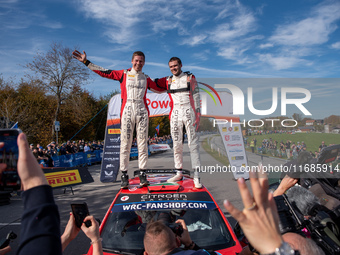 Nikolay Gryazin and Konstantin Aleksandrov, driving a Citroen C3 for the DG Sport Competition team, celebrate the victory of WRC2 during the...