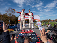 Nikolay Gryazin and Konstantin Aleksandrov, driving a Citroen C3 for the DG Sport Competition team, celebrate the victory of WRC2 during the...