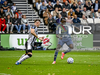 An AFC Ajax Amsterdam player participates in the match between Heracles Almelo and Ajax at the Asito Stadium for the Dutch Eredivisie season...