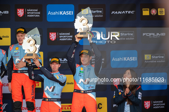 Thierry Neuville and Martijn Wydaeghe, both from Belgium, celebrate third place at the WRC Central European Rally in Central Europe, on Octo...