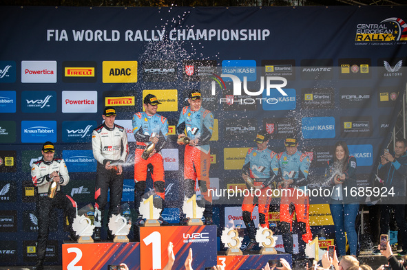 Elfyn Evans (Gbr), Scott Martin (Gbr), Ott Tanak (Est), Martin Jarveoja (Est), Thierry Neuville (Bel), and Martijn Wydaeghe (Bel) celebrate...