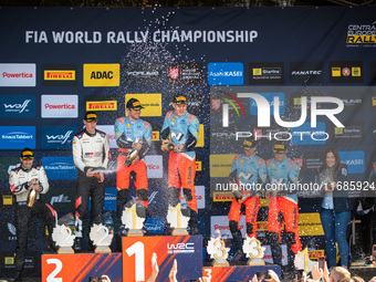 Elfyn Evans (Gbr), Scott Martin (Gbr), Ott Tanak (Est), Martin Jarveoja (Est), Thierry Neuville (Bel), and Martijn Wydaeghe (Bel) celebrate...