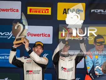 Elfyn Evans and Scott Martin from Great Britain celebrate second place at the WRC Central European Rally from October 17 to 20, 2024. (