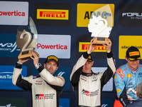 Elfyn Evans and Scott Martin from Great Britain celebrate second place at the WRC Central European Rally from October 17 to 20, 2024. (