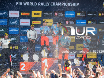 Elfyn Evans (Gbr), Scott Martin (Gbr), Ott Tanak (Est), Martin Jarveoja (Est), Thierry Neuville (Bel), and Martijn Wydaeghe (Bel) celebrate...