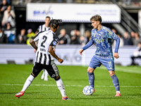 AFC Ajax Amsterdam forward Mika Godts plays during the match between Heracles Almelo and Ajax at the Asito Stadium for the Dutch Eredivisie...