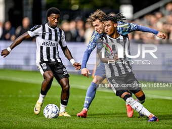 Heracles Almelo midfielder Siloh t Zand, AFC Ajax Amsterdam forward Mika Godts, and Heracles Almelo defender Mimeirhel Benita participate in...