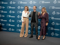 Claudia Gerini, Rocco Papaleo, and Michela Andreozzi attend the ''100 Di Questi Anni'' photocall during the 19th Rome Film Festival at Audit...