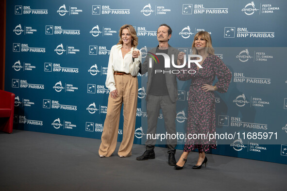 Claudia Gerini, Rocco Papaleo, and Michela Andreozzi attend the ''100 Di Questi Anni'' photocall during the 19th Rome Film Festival at Audit...