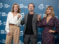 Claudia Gerini, Rocco Papaleo, and Michela Andreozzi attend the ''100 Di Questi Anni'' photocall during the 19th Rome Film Festival at Audit...