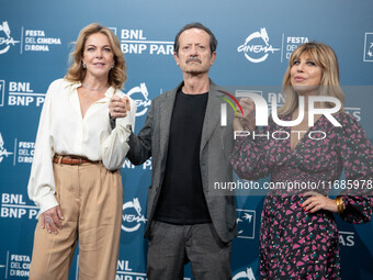 Claudia Gerini, Rocco Papaleo, and Michela Andreozzi attend the ''100 Di Questi Anni'' photocall during the 19th Rome Film Festival at Audit...