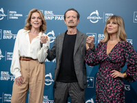 Claudia Gerini, Rocco Papaleo, and Michela Andreozzi attend the ''100 Di Questi Anni'' photocall during the 19th Rome Film Festival at Audit...