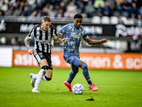 Heracles Almelo forward Suf Podgoreanu and AFC Ajax Amsterdam defender Jorrel Hato play during the match between Heracles Almelo and Ajax at...