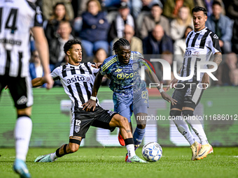 Heracles Almelo defender Ruben Roosken and AFC Ajax Amsterdam forward Bertrand Traore play during the match between Heracles Almelo and Ajax...