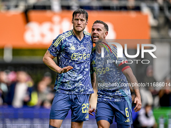 AFC Ajax Amsterdam forward Wout Weghorst and AFC Ajax Amsterdam midfielder Jordan Henderson celebrate the 2-3 goal during the match between...