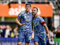 AFC Ajax Amsterdam forward Wout Weghorst and AFC Ajax Amsterdam midfielder Jordan Henderson celebrate the 2-3 goal during the match between...