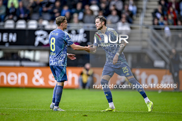 AFC Ajax Amsterdam midfielder Kenneth Taylor and AFC Ajax Amsterdam forward Wout Weghorst participate in the match between Heracles Almelo a...