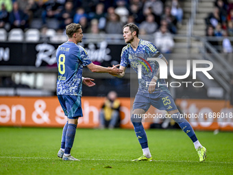 AFC Ajax Amsterdam midfielder Kenneth Taylor and AFC Ajax Amsterdam forward Wout Weghorst participate in the match between Heracles Almelo a...