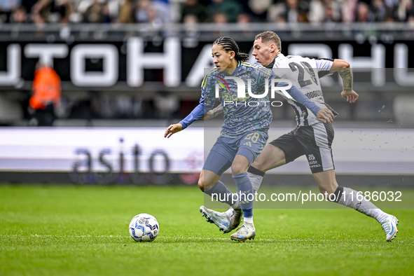 AFC Ajax Amsterdam midfielder Kian Fitz-Jim and Heracles Almelo forward Suf Podgoreanu play during the match between Heracles Almelo and Aja...