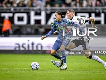 AFC Ajax Amsterdam midfielder Kian Fitz-Jim and Heracles Almelo forward Suf Podgoreanu play during the match between Heracles Almelo and Aja...