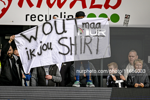 Fans of Heracles Almelo display a banner for AFC Ajax Amsterdam forward Wout Weghorst during the match between Heracles Almelo and Ajax at t...