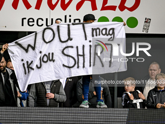 Fans of Heracles Almelo display a banner for AFC Ajax Amsterdam forward Wout Weghorst during the match between Heracles Almelo and Ajax at t...